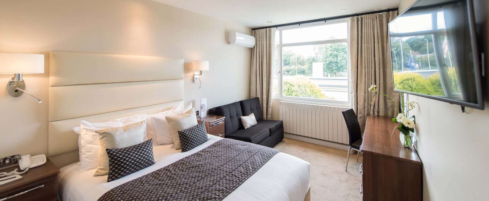 Devon Hotel Accommodation (203) Bed with Desk and Seating Area