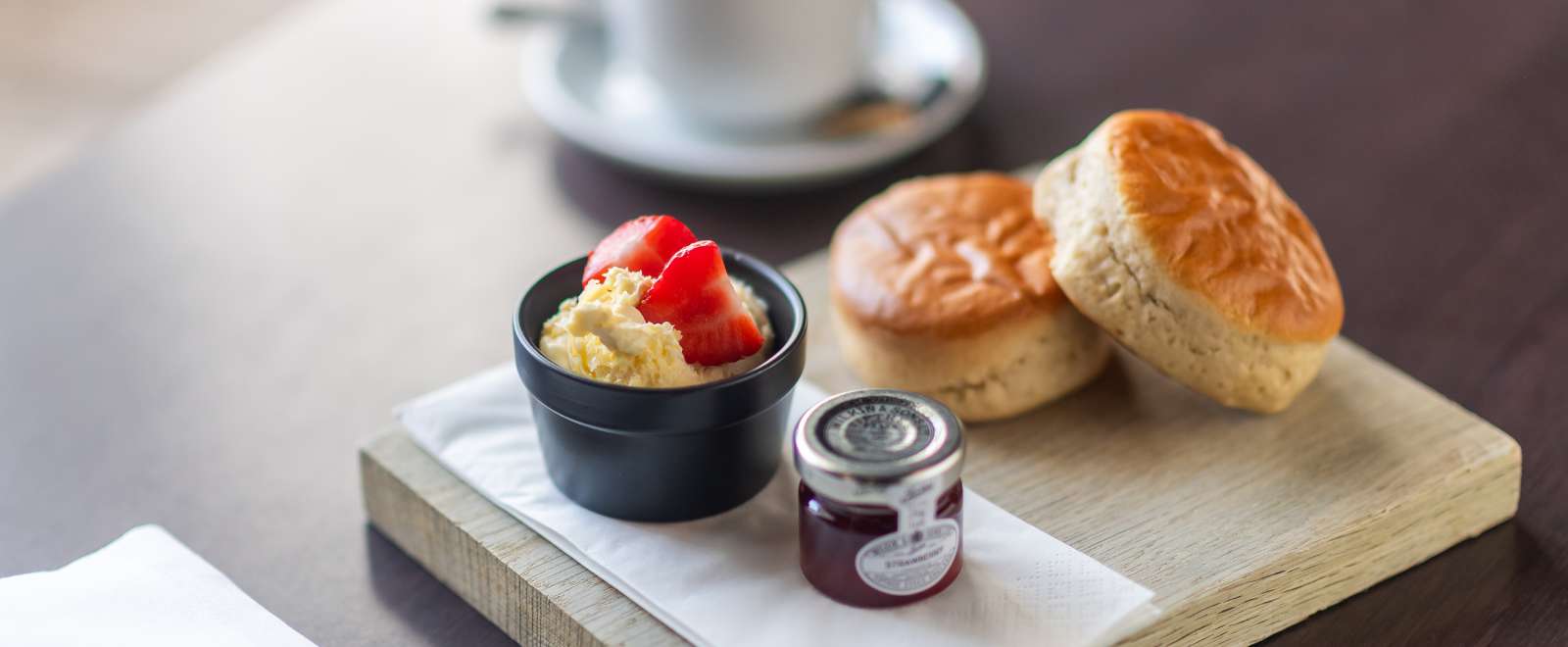 Cream tea, tub of jam and clotted cream 