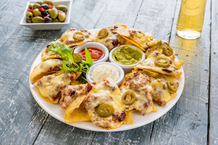 Devon Hotel Restaurant Dining Beef Chilli Nachos with Jalapenos Guacamole Salsa and Sour Cream
