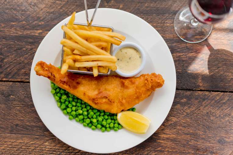 Devon Hotel Restaurant Dining Battered Fish with Chips and Peas