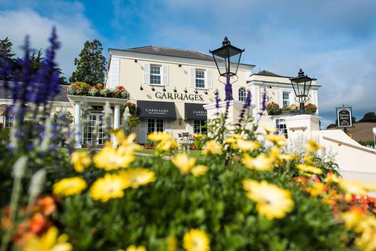Devon Hotel Carriages Restaurant Exterior with Flowers