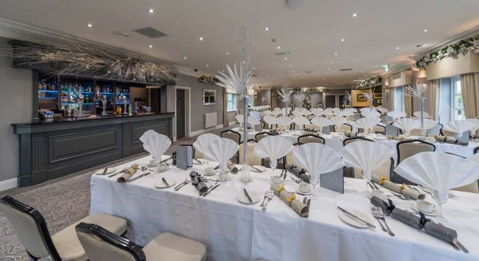 Devon Hotel Regency Suite Dining Area and Bar Decorated for Christmas