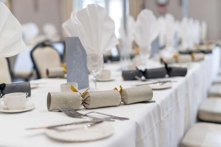 Devon Hotel Restaurant Dining Christmas Crackers on Table with Place Setting