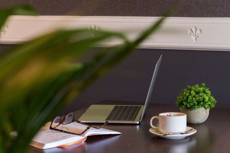 Devon Hotel Laptop with Note Pad and Coffee