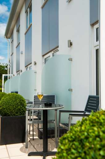 glass of wine outside a bedroom at devon hotel