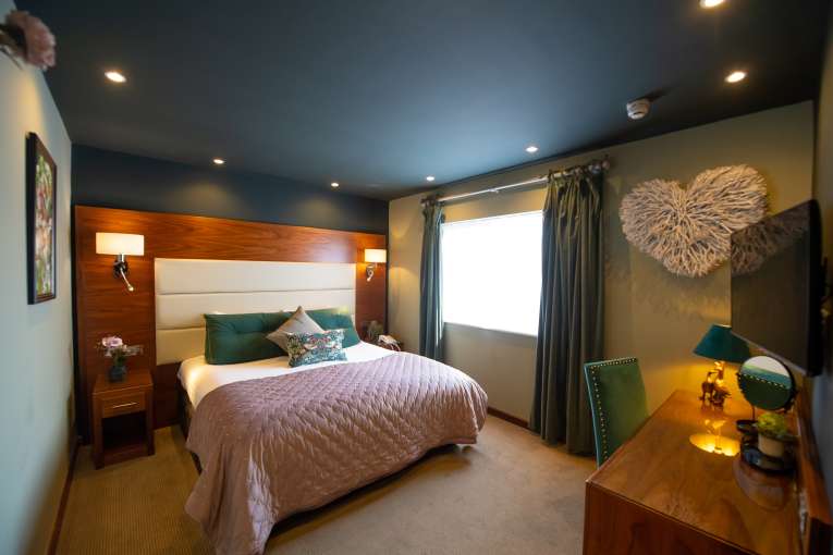 beautiful bedroom in green and blue