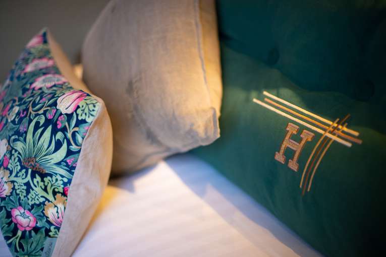 cushions on bed