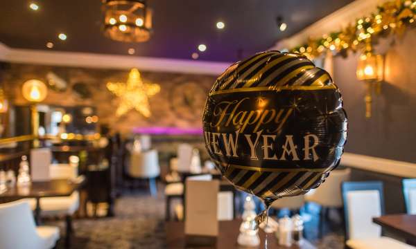 Carriages Restaurant Decorated with New Years Balloon