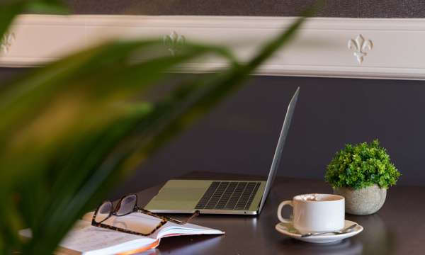 Devon Hotel Laptop with Note Pad and Coffee