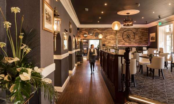 Devon Hotel Carriages Restaurant Waitress in Dining Area