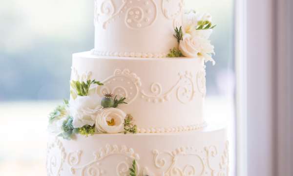 Large wedding cake decorated with roses
