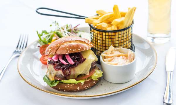 The Homemade Signature Burger with Chips and Coleslaw at the Barnstaple Hotel