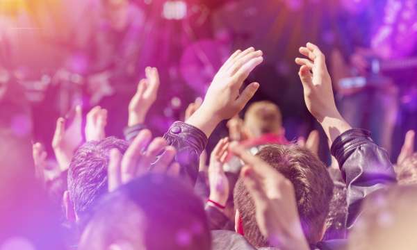 People dancing at a concert 