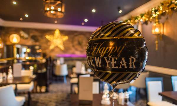 A celebration balloon inside Carriages Restaurant in Exeter