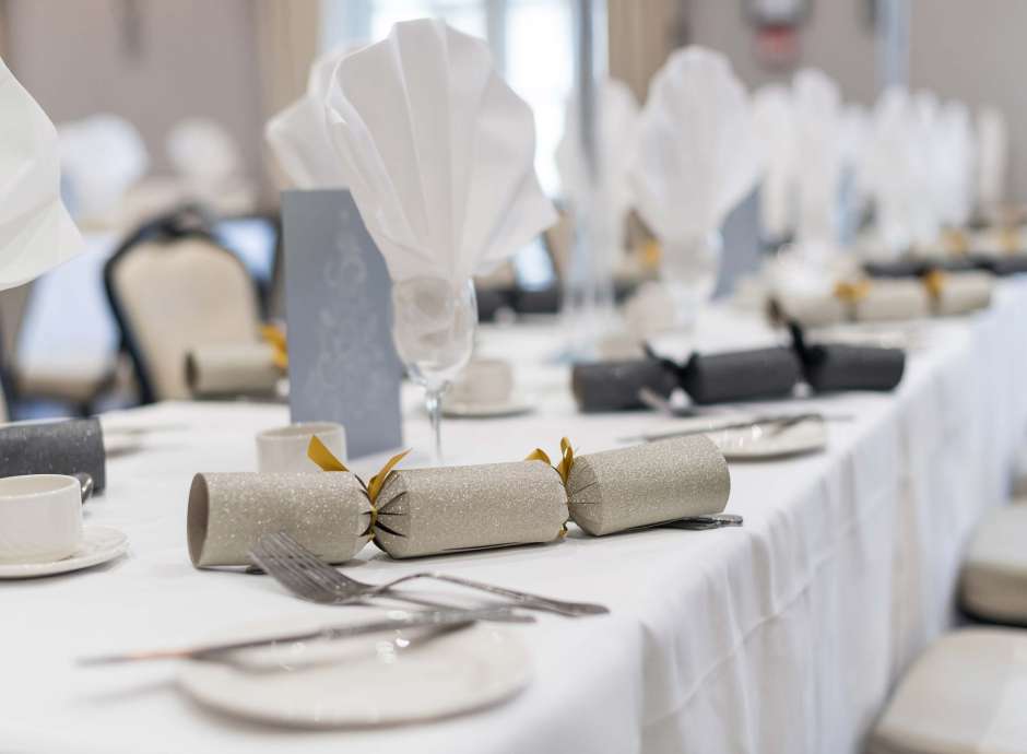 Devon Hotel Restaurant Dining Christmas Crackers on Table with Place Setting