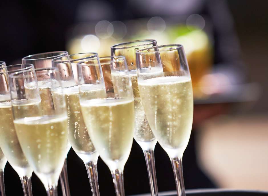 Tray of champagne being served at a Wedding Reception